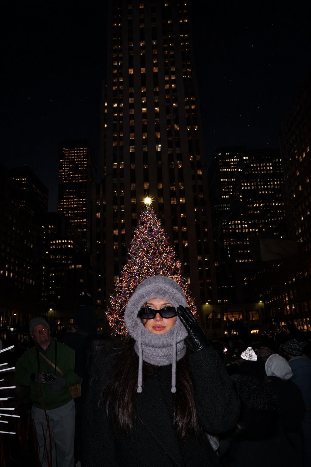 Stone 3-in-1 plush beanie worn with sunglasses and a dark coat on a winter evening
